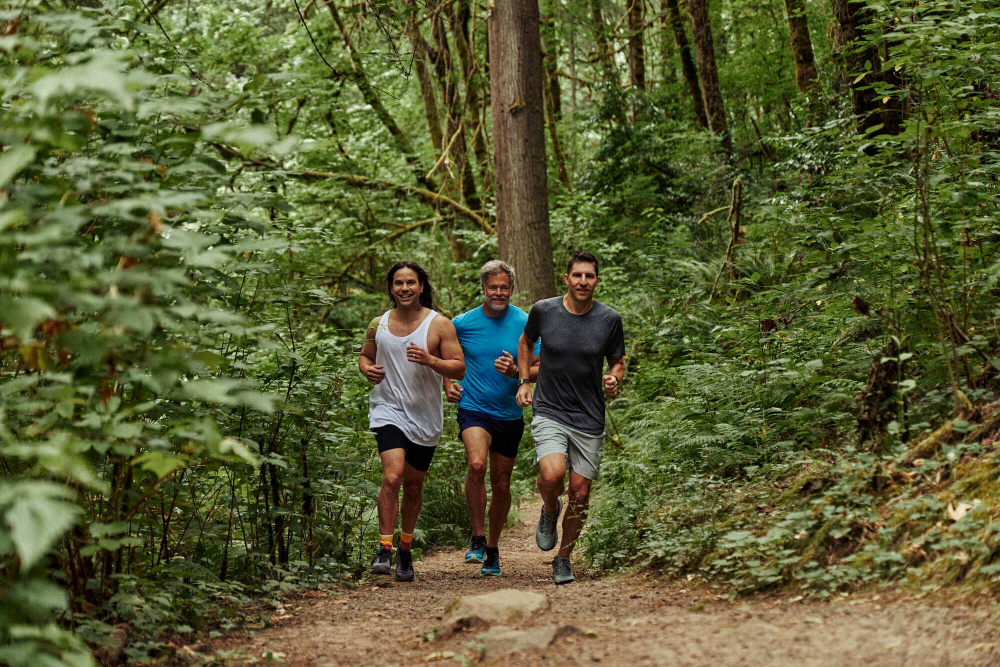 RNWY Founders Running through the woods. 