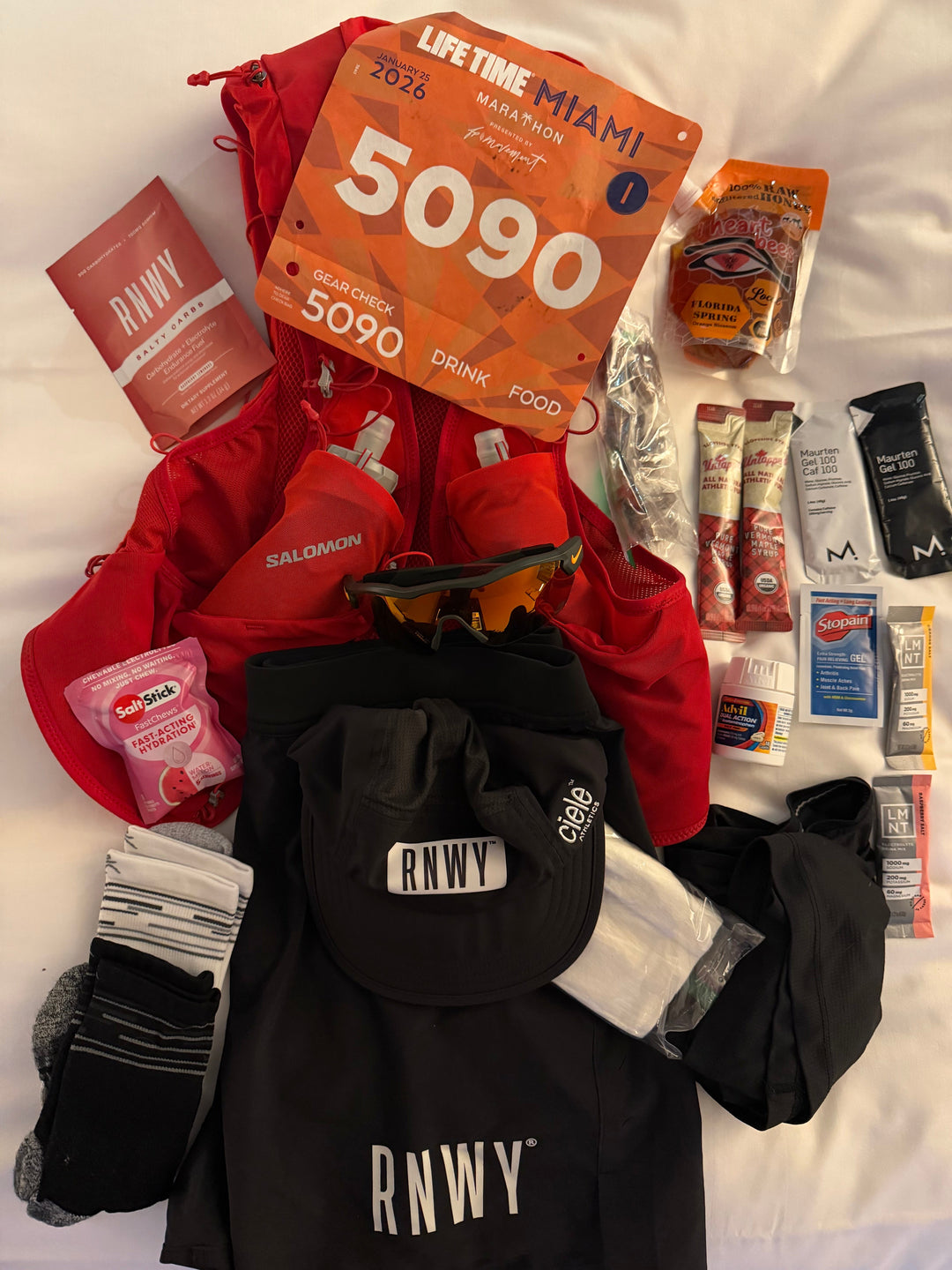 Marathon race gear and nutrition packed before a first marathon