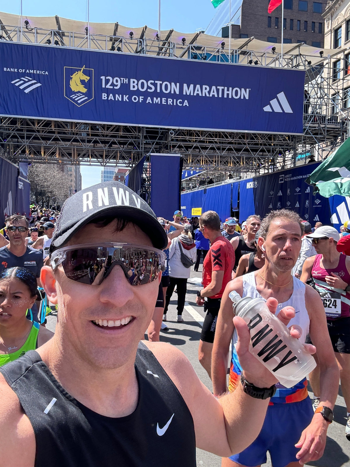 Cameron Schuler finishing the Boston Marathon 2025, showcasing endurance and recovery supported by RNWY sports nutrition